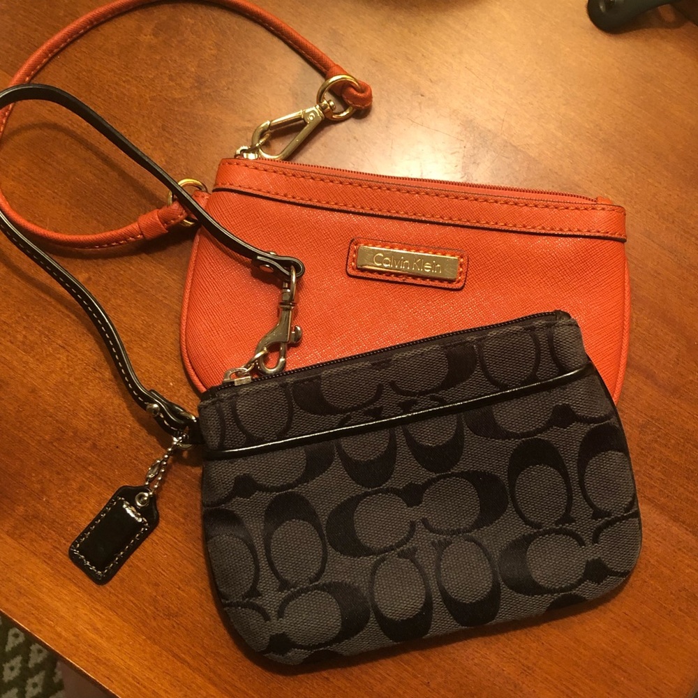 Both Coach and Calvin Klein wristlet bags